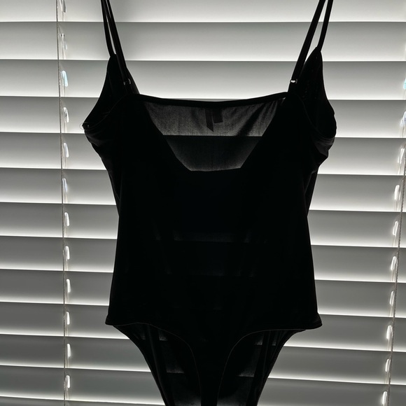 Out From Under Bodysuit: Black Solid
Tops - Size Medium with thong bodysuit. - Picture 3 of 7
